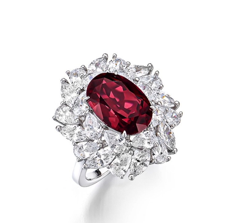 Silver-toned Cancer ring: oval ruby (zodiac stone) surrounded by diamonds. Luxe warm design, perfect for formal wear or Cancer birthdays.