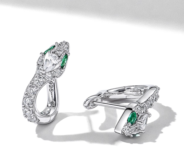 April Birthstone Diamond Drop Earrings – Silver-toned snake-inspired design with pear-cut genuine diamonds and accent emeralds. Brilliant and eye-catching, perfect for formal occasions or April celebrations.
