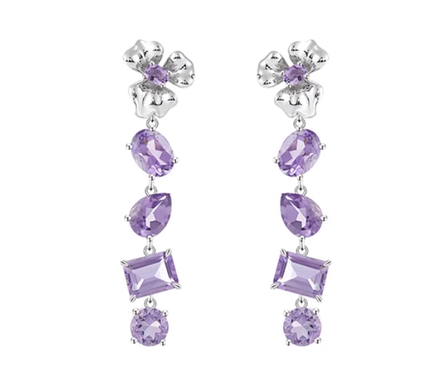 Pair of silver-toned drop earrings with a flower-shaped top and layered purple amethysts (oval, marquise, square, round cuts). Elegant cascading design, ideal for adding a touch of color to outfits.