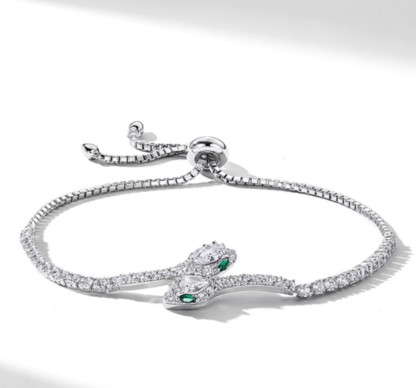 April Birthstone Diamond Bracelet – Silver-toned adjustable chain with a snake motif, set with pear-cut genuine diamonds and accent emeralds. Versatile and luxurious, ideal for April gifting or layering.