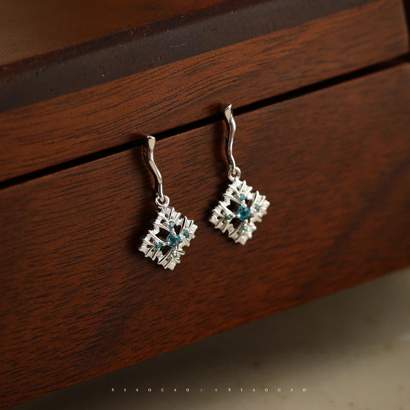 Topaz S925 Silver Snowflake Earrings