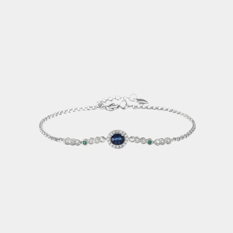 Sapphire station bracelet shown against a clean white background