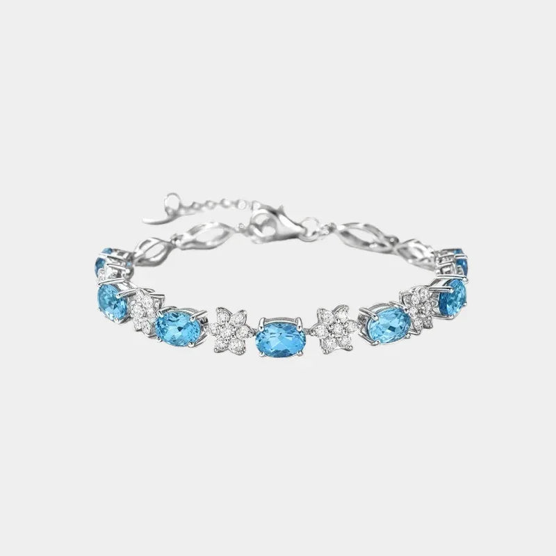 Blue Topaz Floral Station Bracelet — isolated full bracelet view