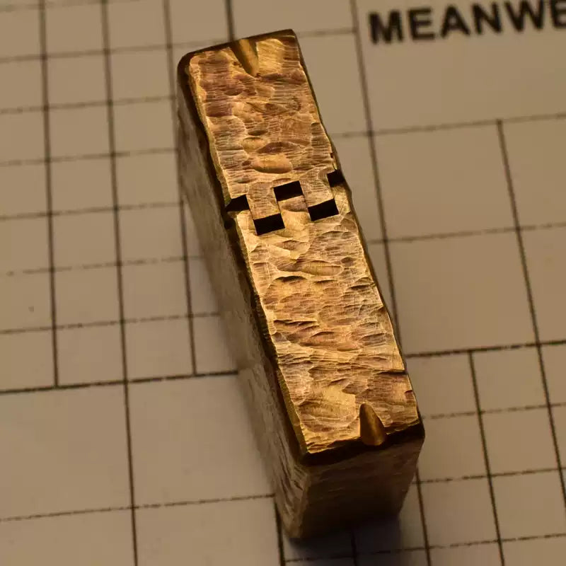 7th anniversary with a handcrafted brass armor lighter