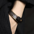Handmade Ebony Wood & Aged Brass Open Cuff Bracelet, shown worn for scale and styling