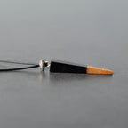 Handmade Wooden Triangle Necklace, product view on a neutral background