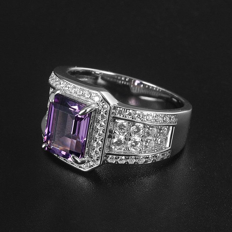 men's emerald-cut amethyst pavé ring low-angle product view on a dark background