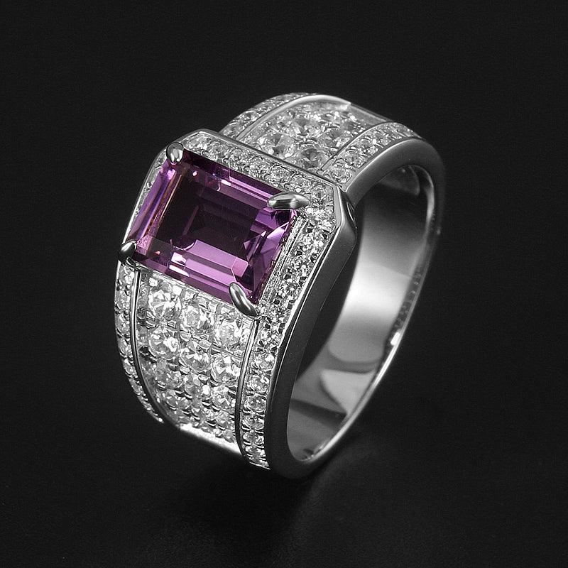 men's emerald-cut amethyst pavé ring three-quarter product view on a dark background