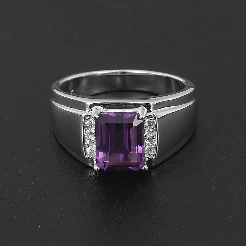 men's emerald-cut amethyst ring three-quarter product view on a dark background
