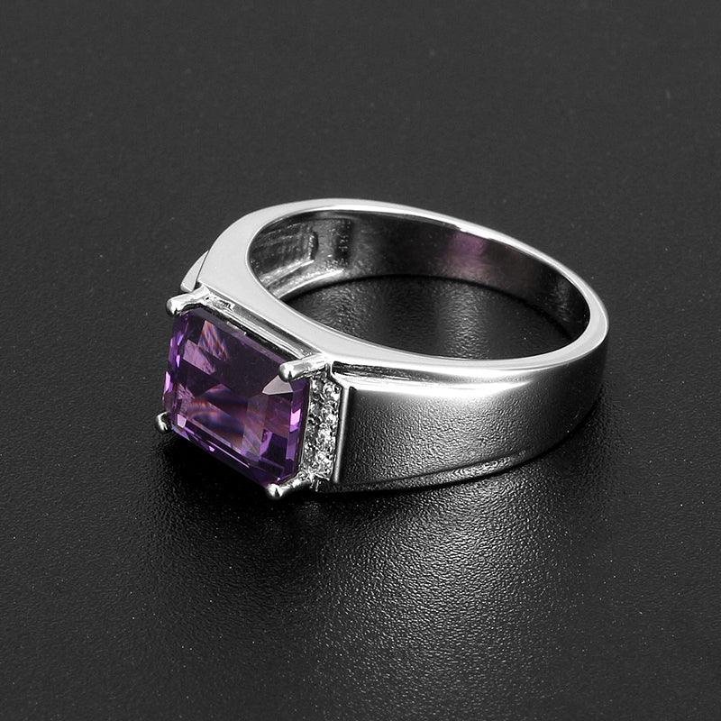 men's emerald-cut amethyst accent ring low-angle product view on a dark background