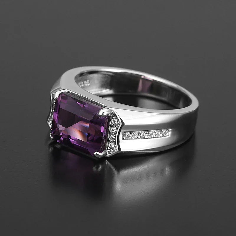 men's emerald-cut amethyst accent ring low-angle product view on a dark background