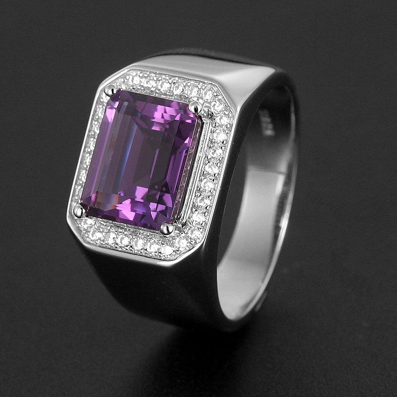 men's emerald-cut amethyst halo ring three-quarter product view on a dark background