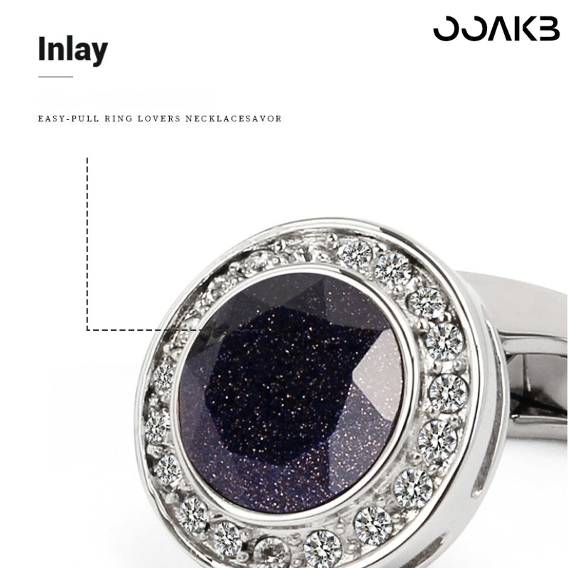 Crystal mosaic detail on white gold plated cufflinks, highlighting inlay craftsmanship.