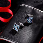 Detail of copper electroplated silver surface on the cufflinks.
