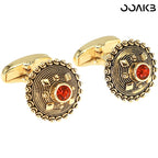 Gold-plated crystal cufflinks shown from the front, highlighting round design.