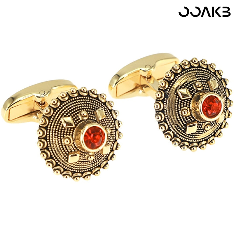 Gold-plated crystal cufflinks shown from the front, highlighting round design.