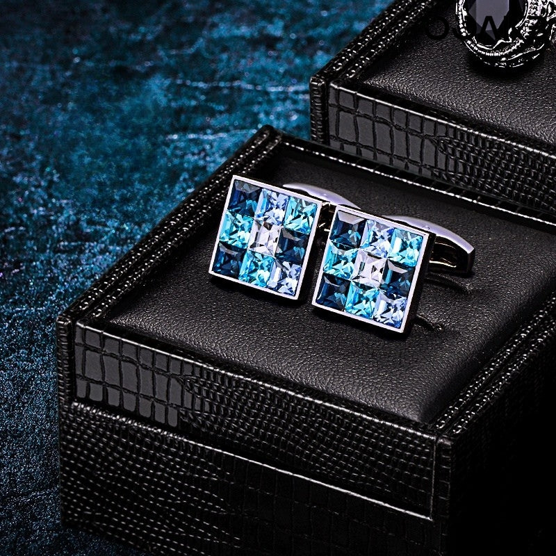Cufflinks with included box, carrying bag, and cleaning cloth.
