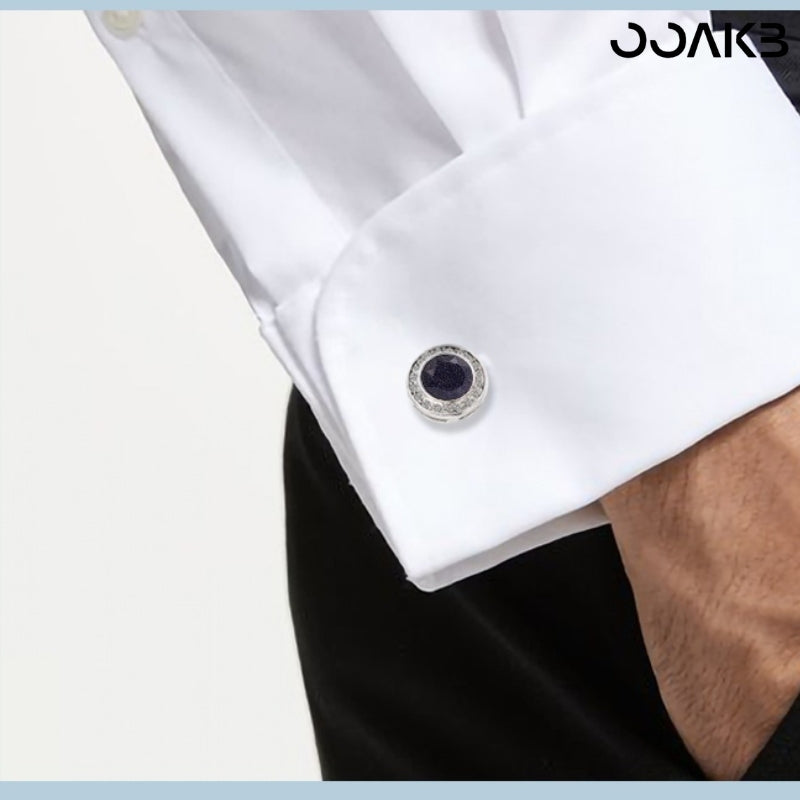 White gold crystal cufflinks worn on French cuffs, showing elegant style.