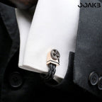 Leather-accented cufflinks on shirt, elegant for 3rd anniversary celebration.
