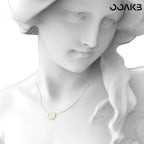 Gold-plated clock pendant necklace on a mannequin, highlighting its modern flowing design for 1st anniversary gifting.
