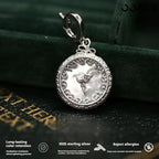 Close-up of 925 silver clock pendant with mother-of-pearl, showcasing filigree design for paper wedding.