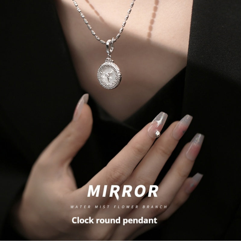 Woman wearing 925 silver clock pendant, highlighting its chic appeal for 1st anniversary.