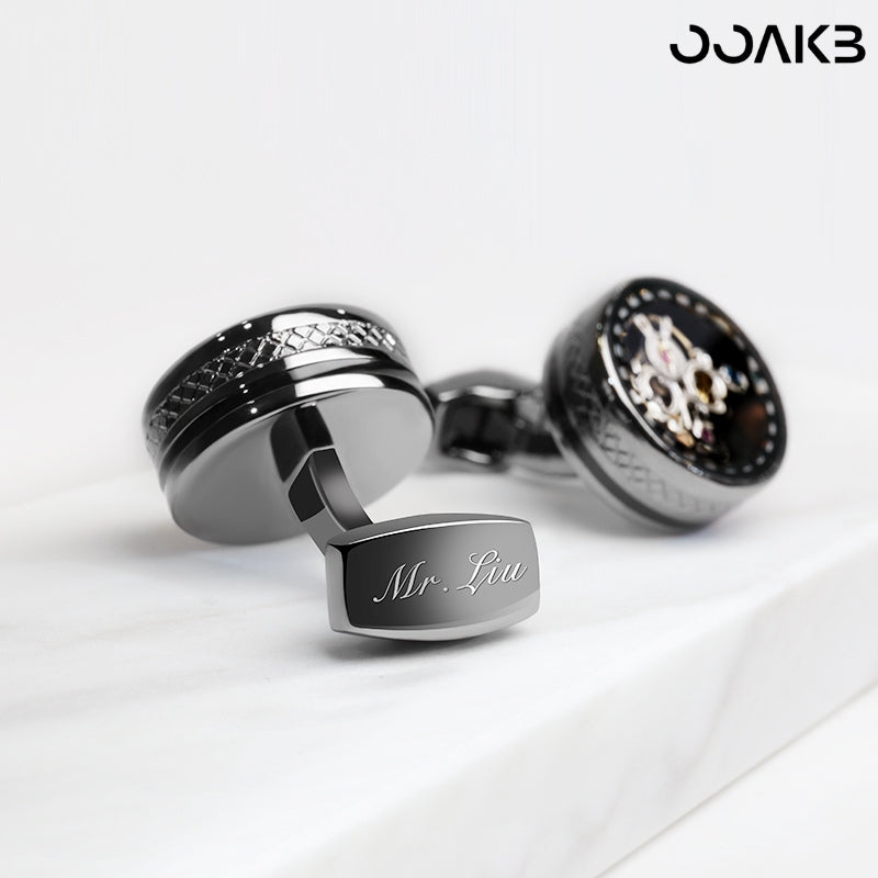 Custom-engraved tourbillon gear cufflinks, personalized for paper wedding.