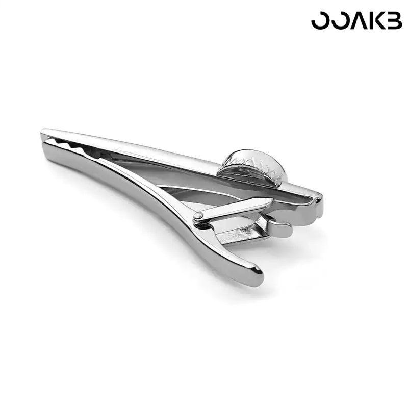 Custom-engraved clock gear tie clip, personalized for paper wedding.
