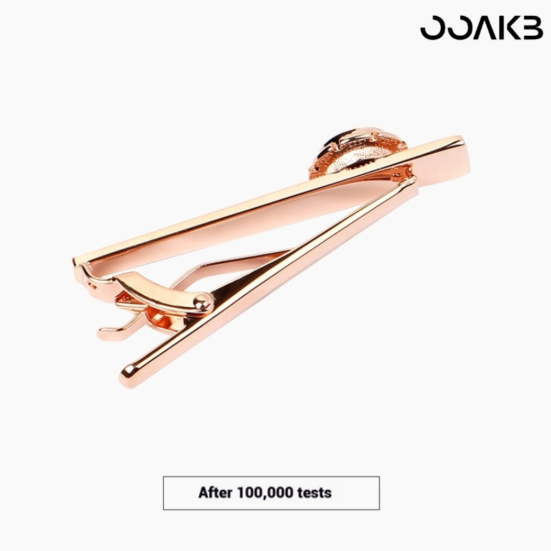 Text indicating the tie clip passed 100,000 durability tests.