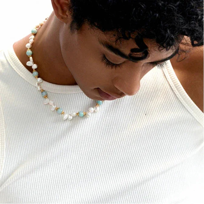 Amazonite and Baroque Pearl Beaded Necklace — downward-looking model portrait showing the necklace curve