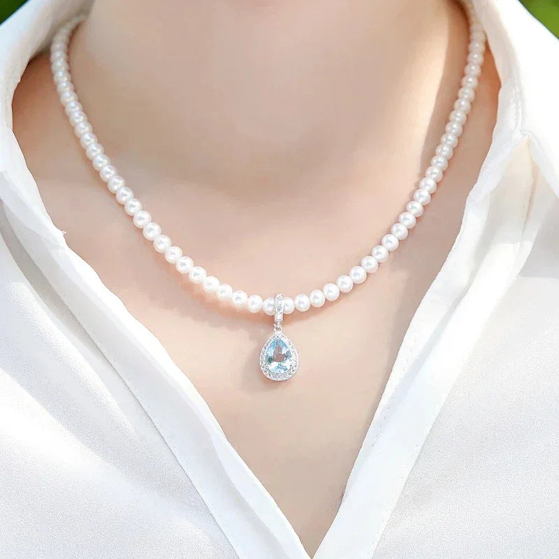 Aquamarine Teardrop Pendant Pearl Necklace — second neckline-worn view from a slightly different crop