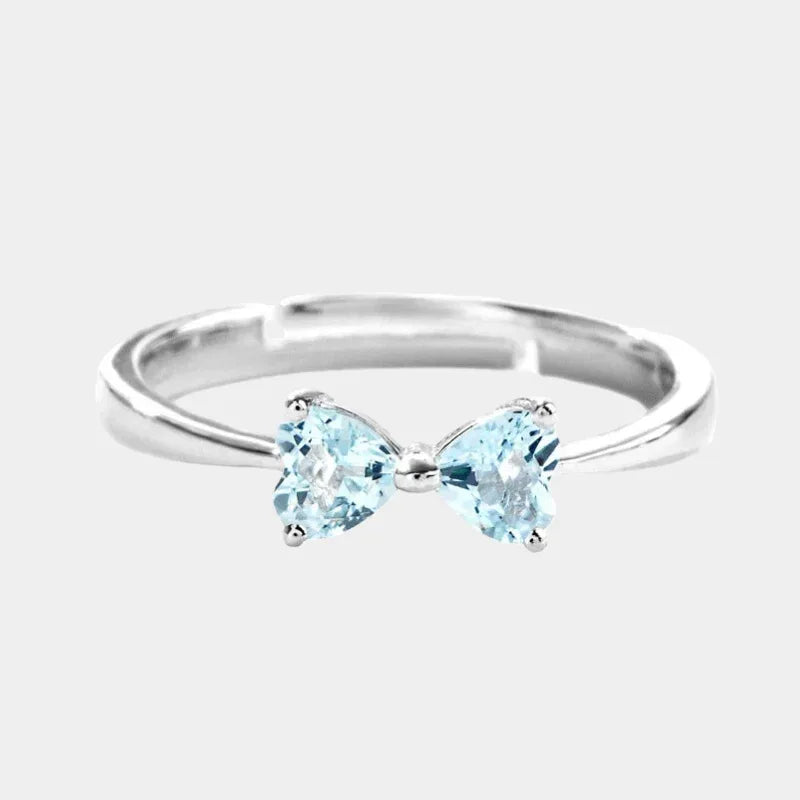 Aquamarine Bow Open Ring front product view on a white background