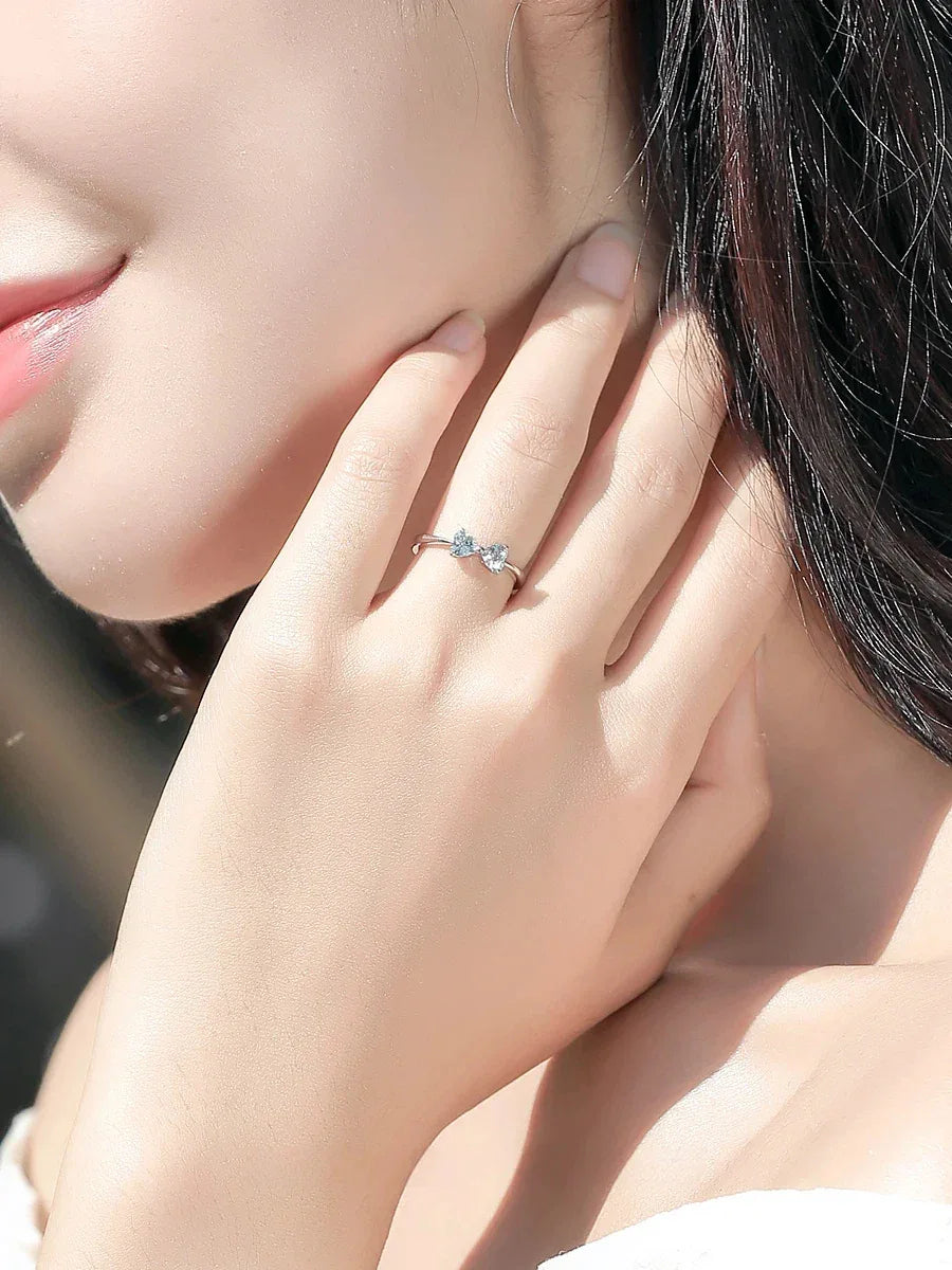 Aquamarine Bow Open Ring styled hand view showing ring scale