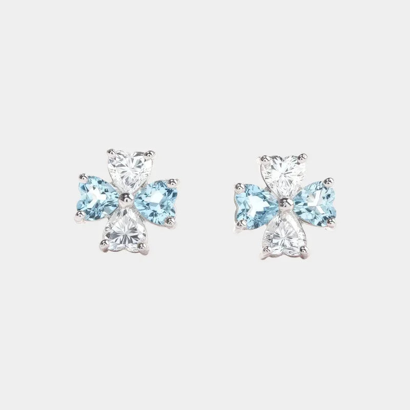 Aquamarine Bow Stud Earrings paired product view on a white background