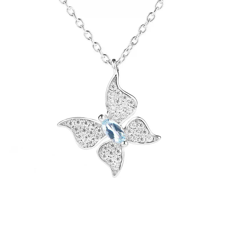 Aquamarine Butterfly Pendant Necklace styled neckline view showing pendant scale