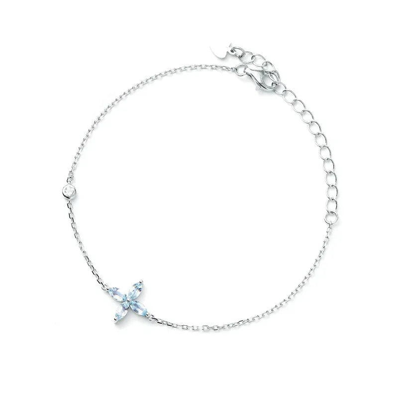 Aquamarine Cross Station Bracelet bracelet view on a dark background