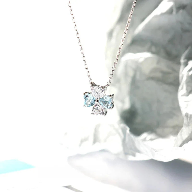 Aquamarine Four-Stone Cluster Pendant Necklace styled neckline view showing pendant scale