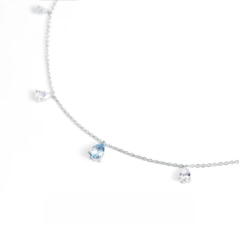 Aquamarine Station Drop Necklace angled pendant detail on white