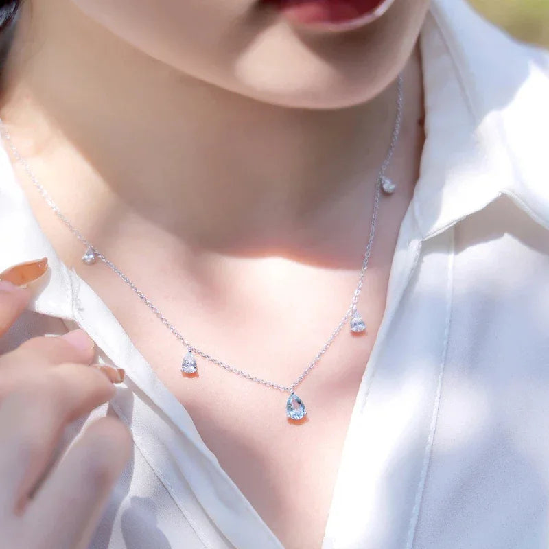 Aquamarine Station Drop Necklace styled neckline view showing pendant scale