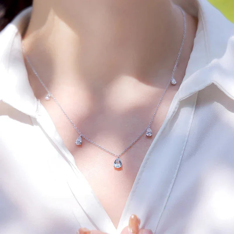 Aquamarine Station Drop Necklace worn at the neckline from a second angle