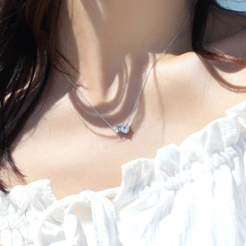 Aquamarine Two-Stone Pendant Necklace styled neckline view showing pendant scale