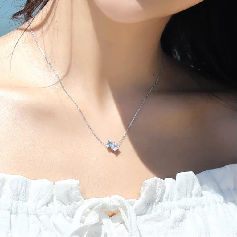 Aquamarine Two-Stone Pendant Necklace worn at the neckline from a second angle