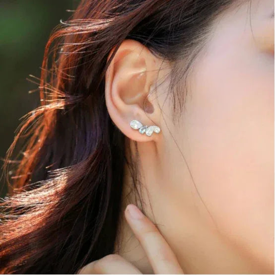 Asymmetric Aquamarine Leaf Drop Earrings side view showing posts and settings