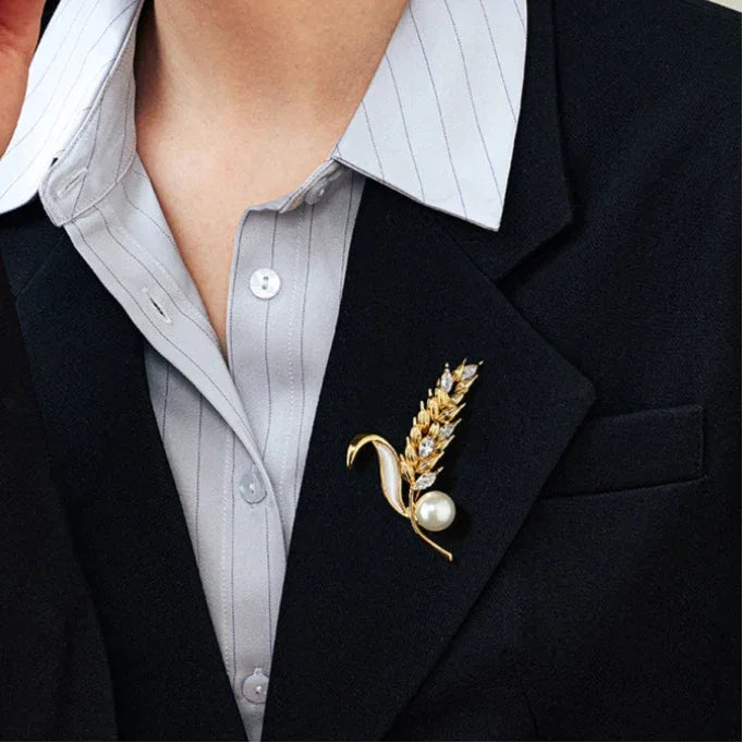 Shell Pearl Golden Wheat Brooch — close blazer-worn view showing the upright wheat ear