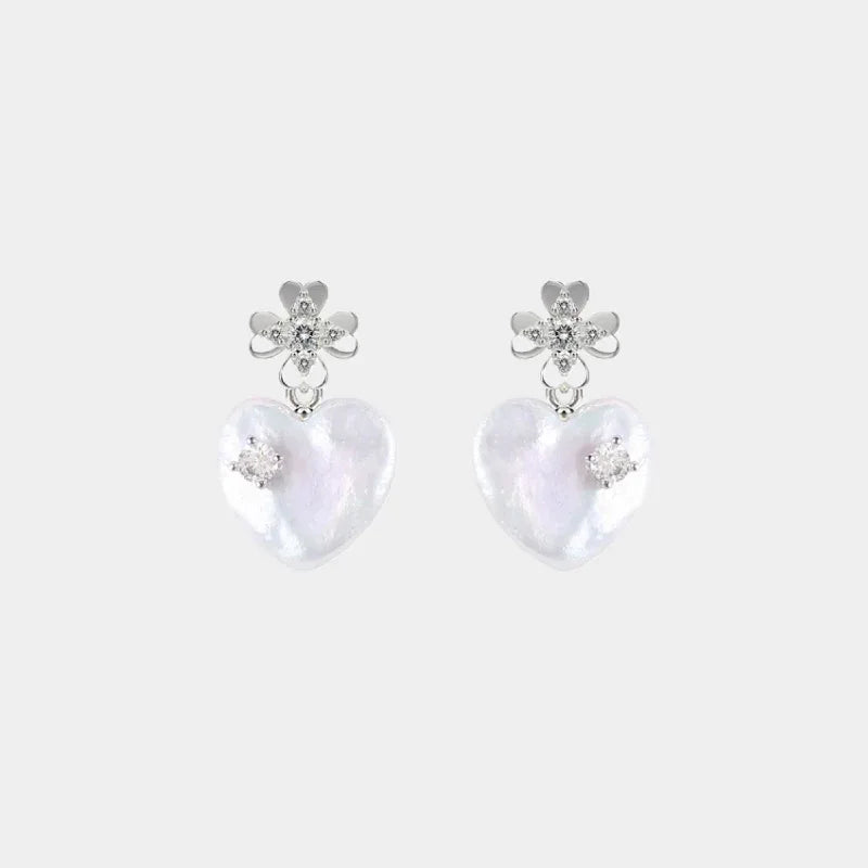 Pearl Heart Drop Earrings with Floral Tops — isolated front pair with floral stud tops and luminous heart pearl drops