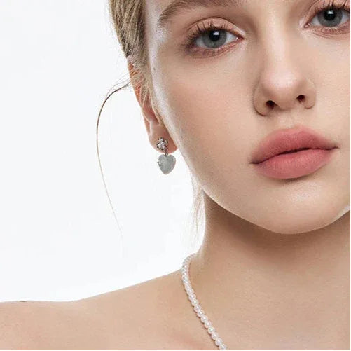 Pearl Heart Drop Earrings with Floral Tops — closer portrait showing the floral top and heart drop