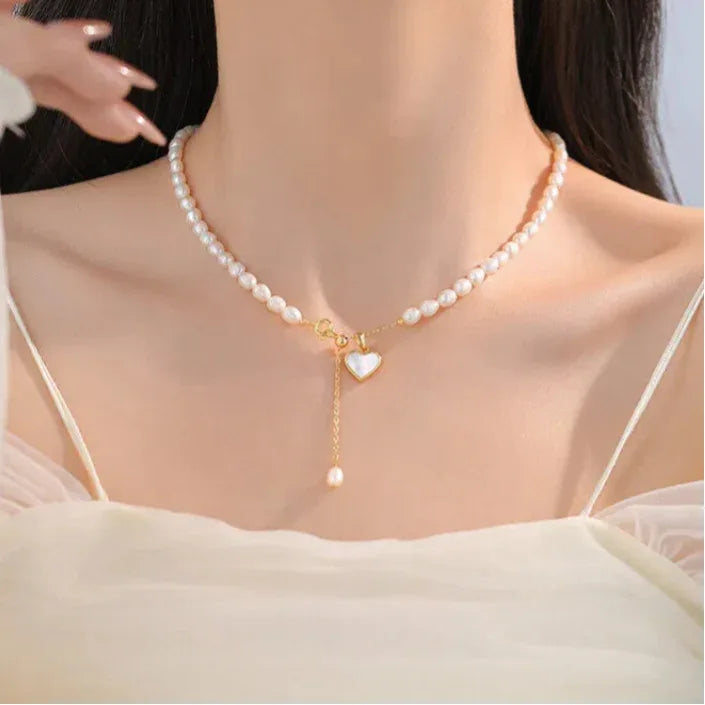 Pearl Toggle Lariat Necklace with Open Heart — alternate worn view with the open heart centered