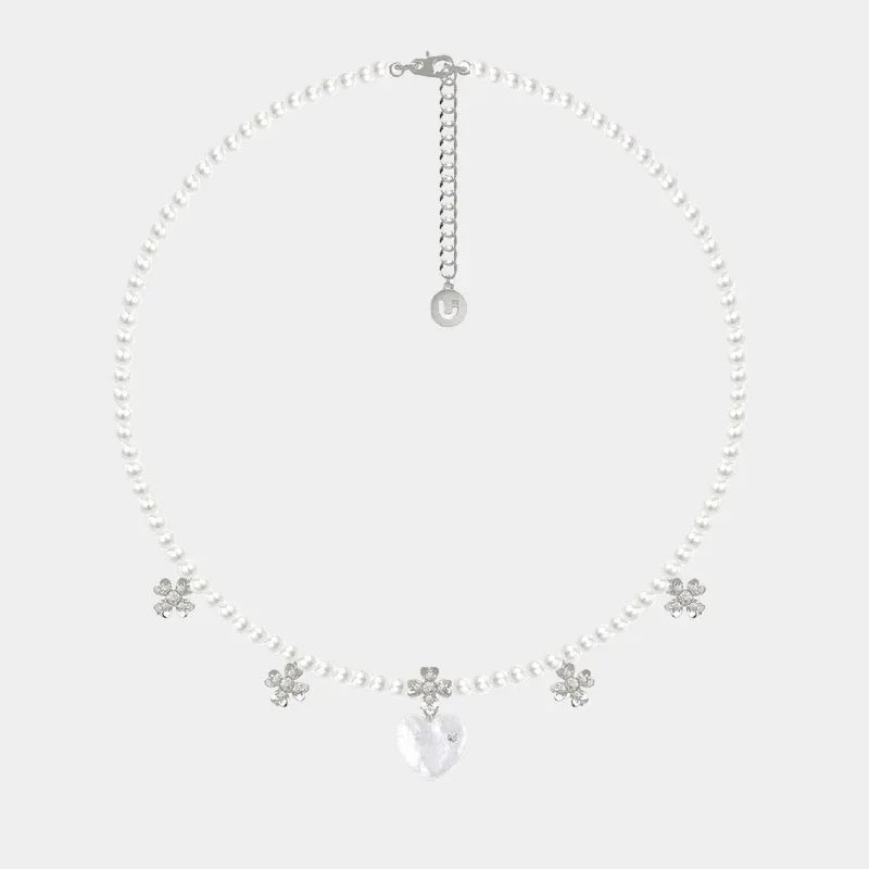 Pearl Heart Necklace with Floral Stations — front necklace view with spaced flower stations and a heart center drop