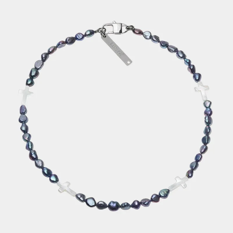 Dark Baroque Pearl Necklace with White Cross Accents — front view of dark baroque pearl necklace with spaced white crosses
