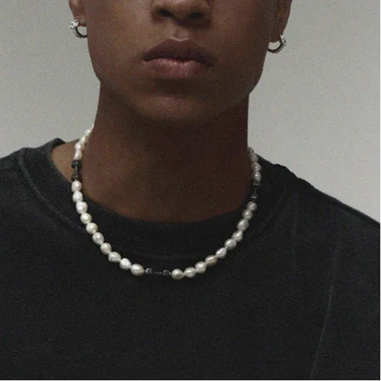 Baroque Pearl Necklace with Black Dumbbell Spacers — closer neckline-worn view showing the spacer placement